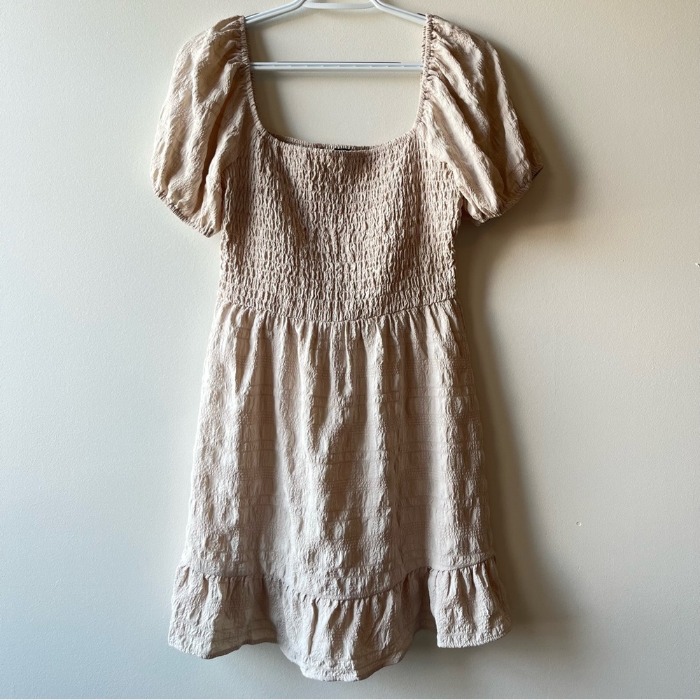 Beige colored mini dress